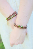 Natural Wood Beaded Bracelet in honey - green glass beads accents